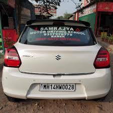 Samrajya Motor Driving School professional driving training session with instructor