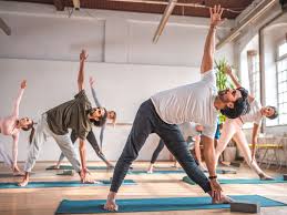Yoga by Rachna Shah near me conducting professional yoga session